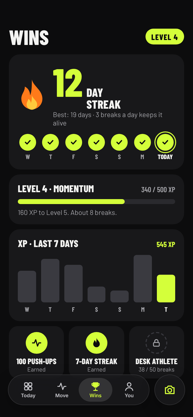 The Wins screen: a 12-day streak, level 4 and earned badges