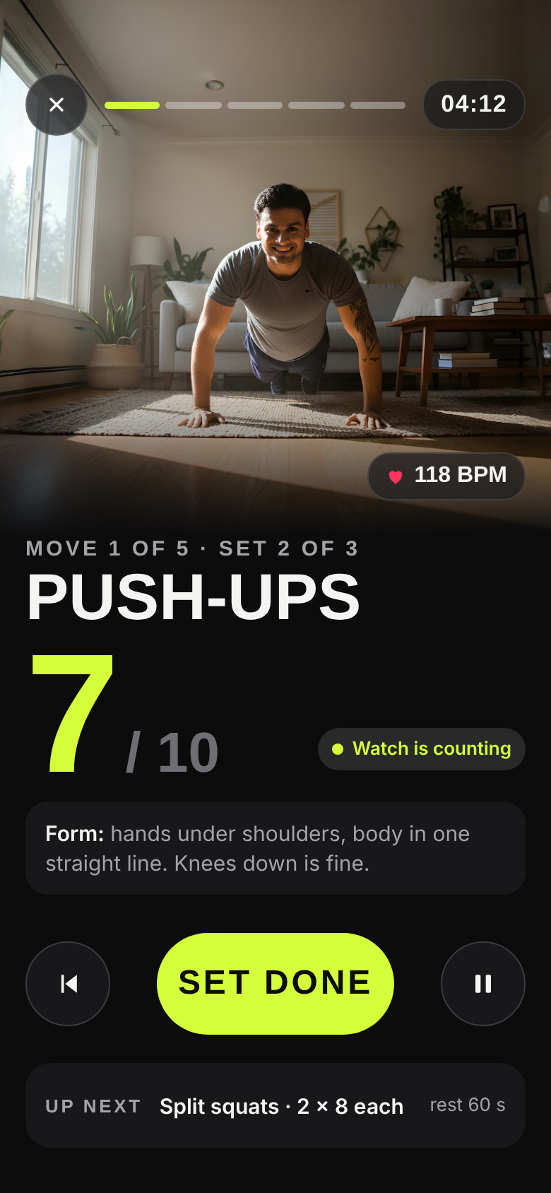 The workout player: push-ups, 7 of 10, with form tips